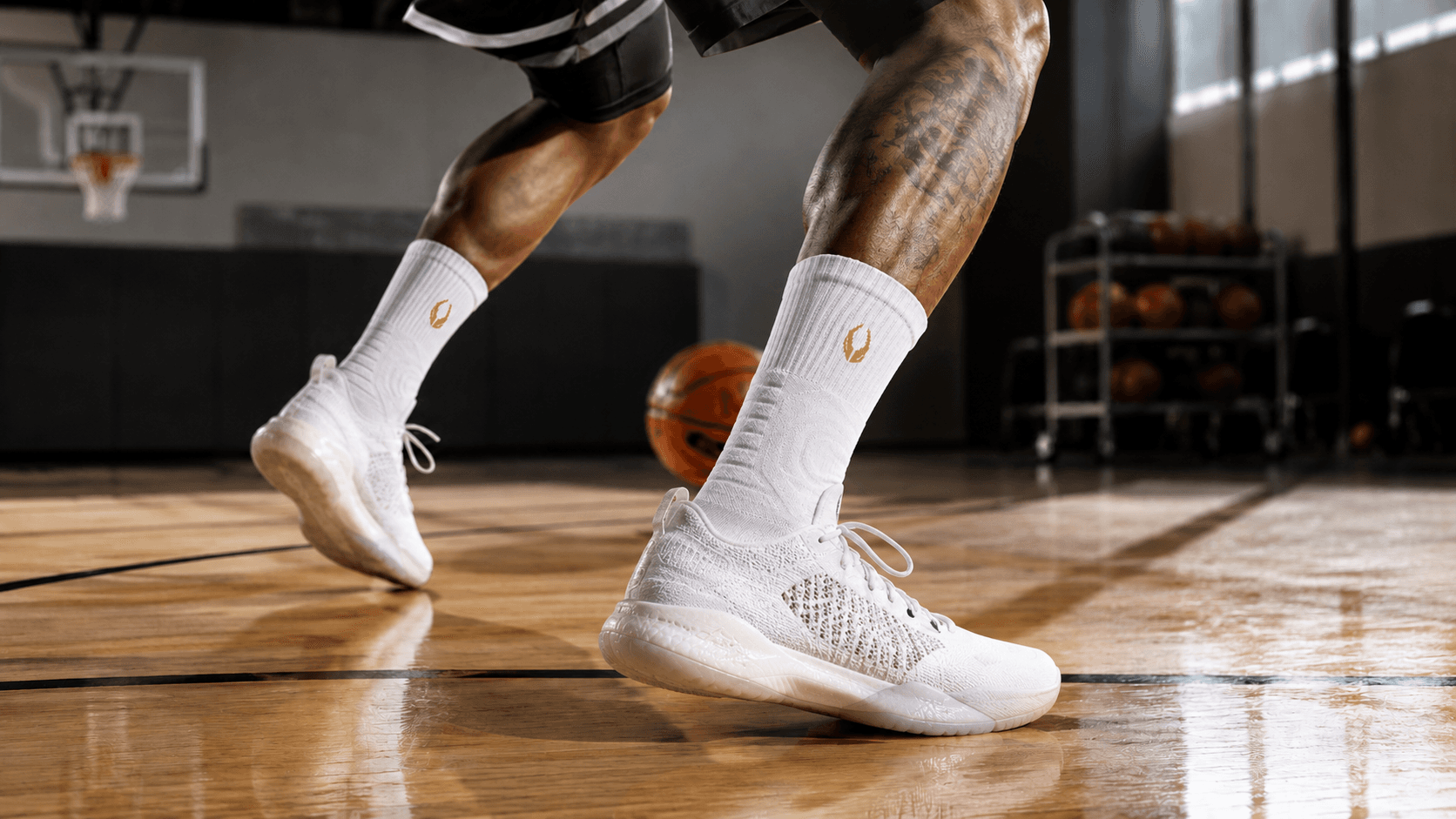 Basketball athlete dribbling in HOOF performance crew socks