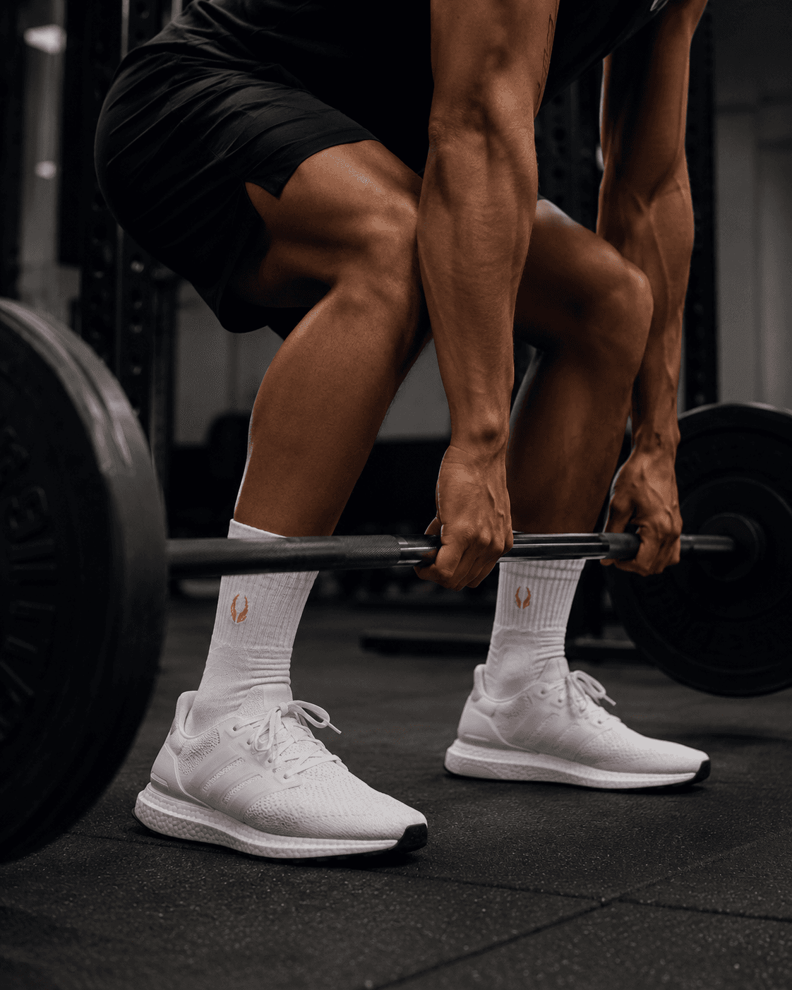 Athlete lifting in HOOF performance crew socks