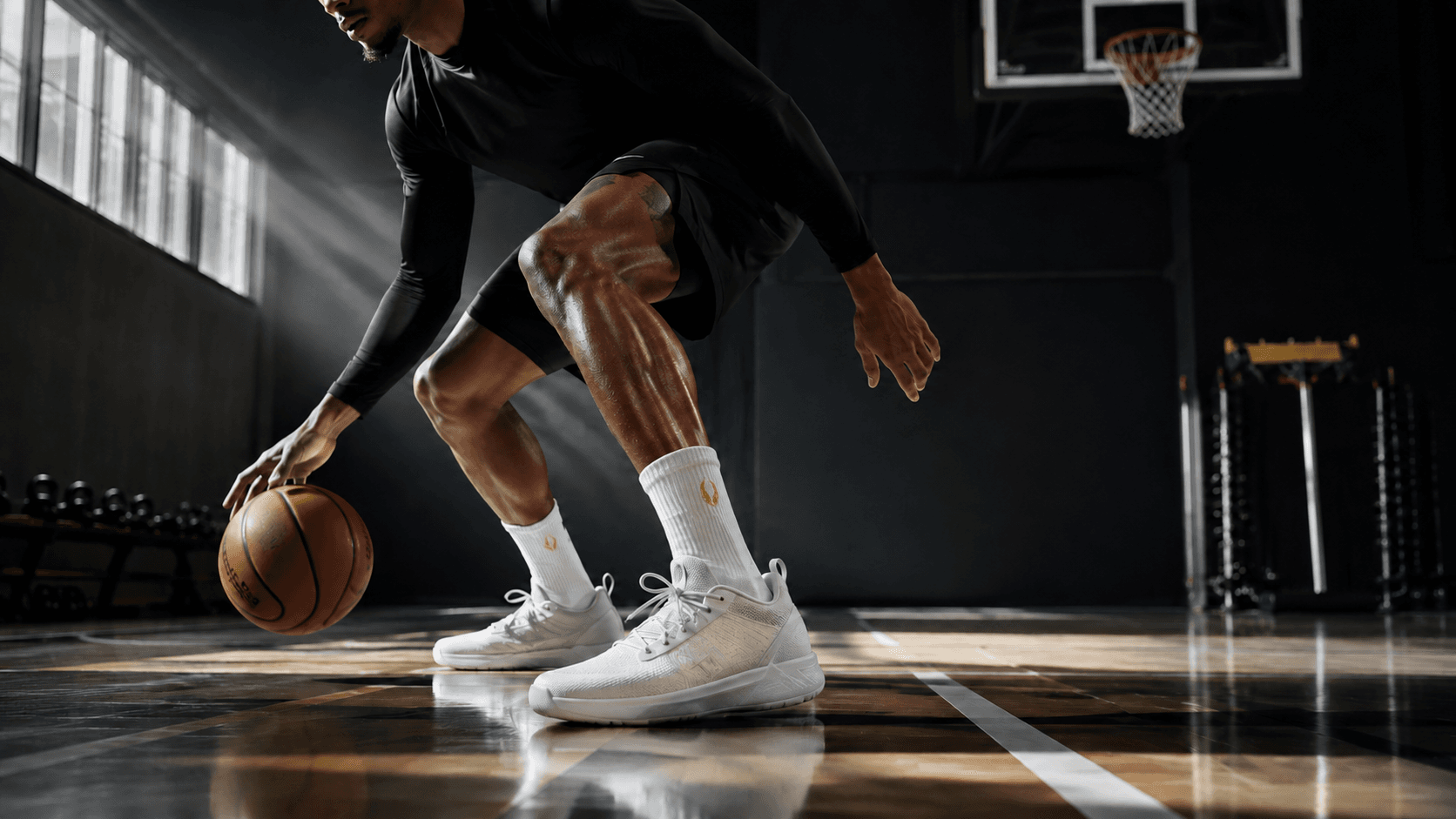 Basketball athlete dribbling in HOOF performance crew socks on court