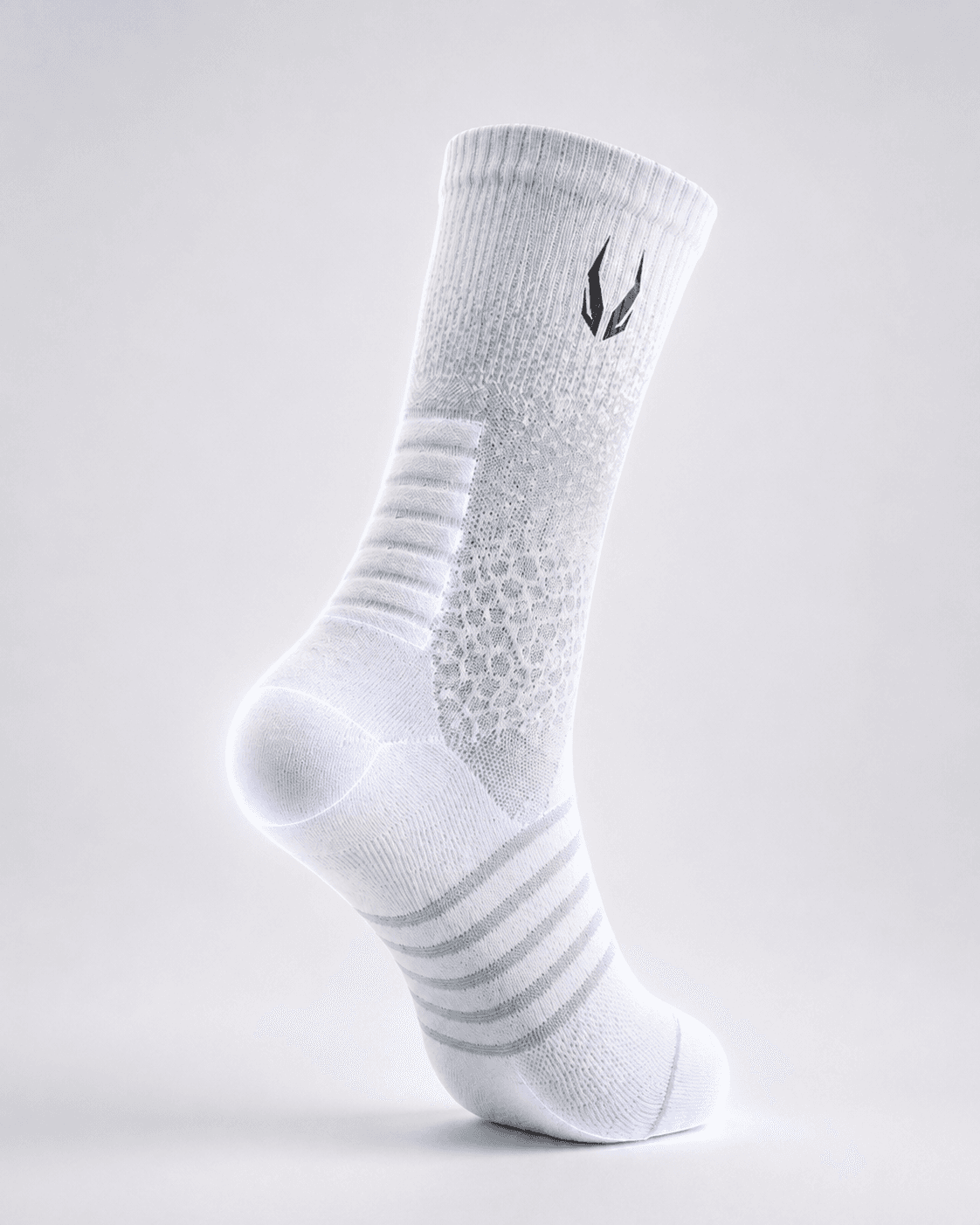 HOOF performance sock with gold logo on the outside — studio product view