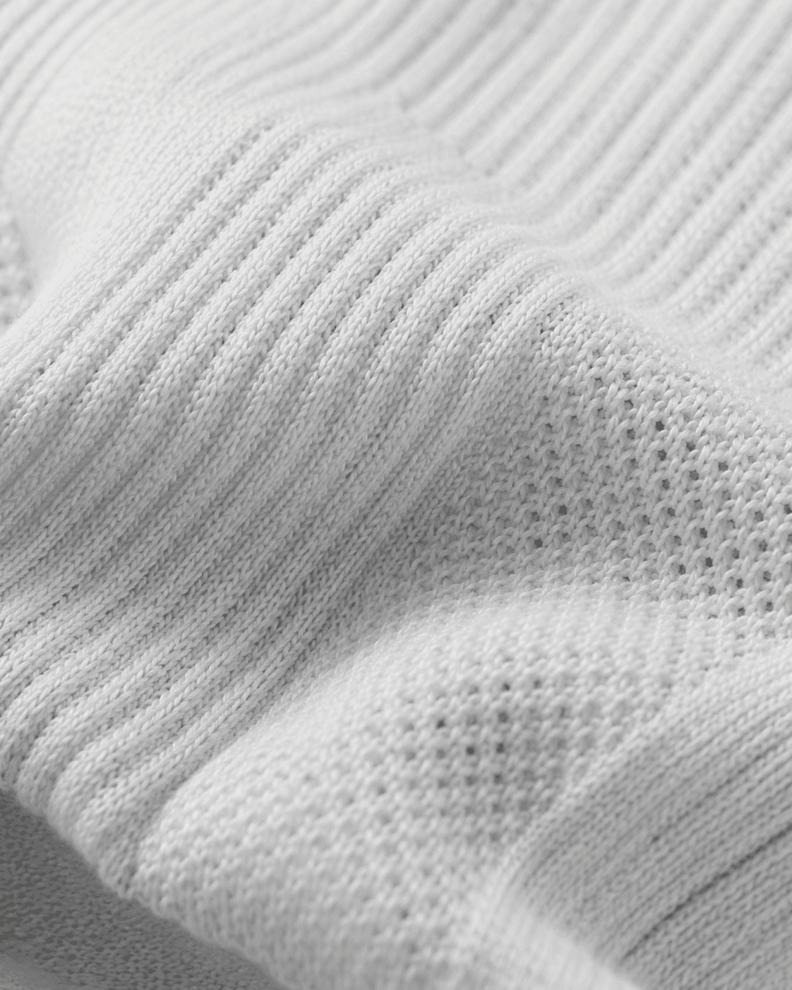 HOOF sock knit texture close-up in studio light — engineered comfort